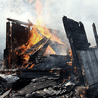 File:Burned-down hut.png